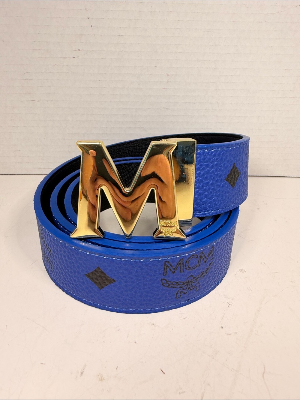 MCM Claus Reversible Belt with Blue Pebbled Leather and Gold-Tone M Buckle